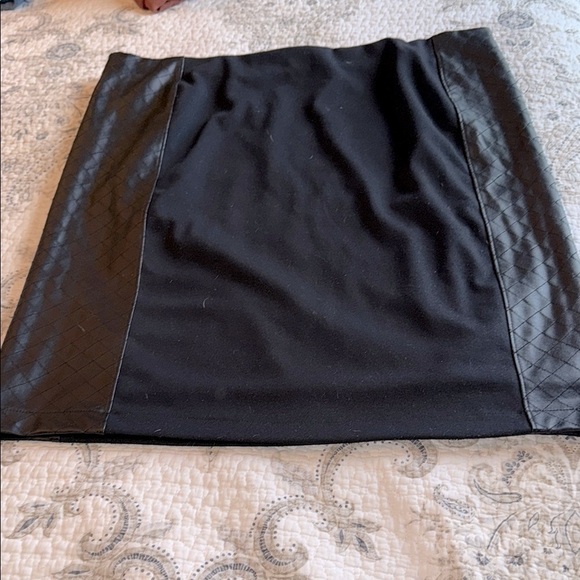 Elegant Black in Black Skirt with Faux Leather Side Detail. - Picture 1 of 6